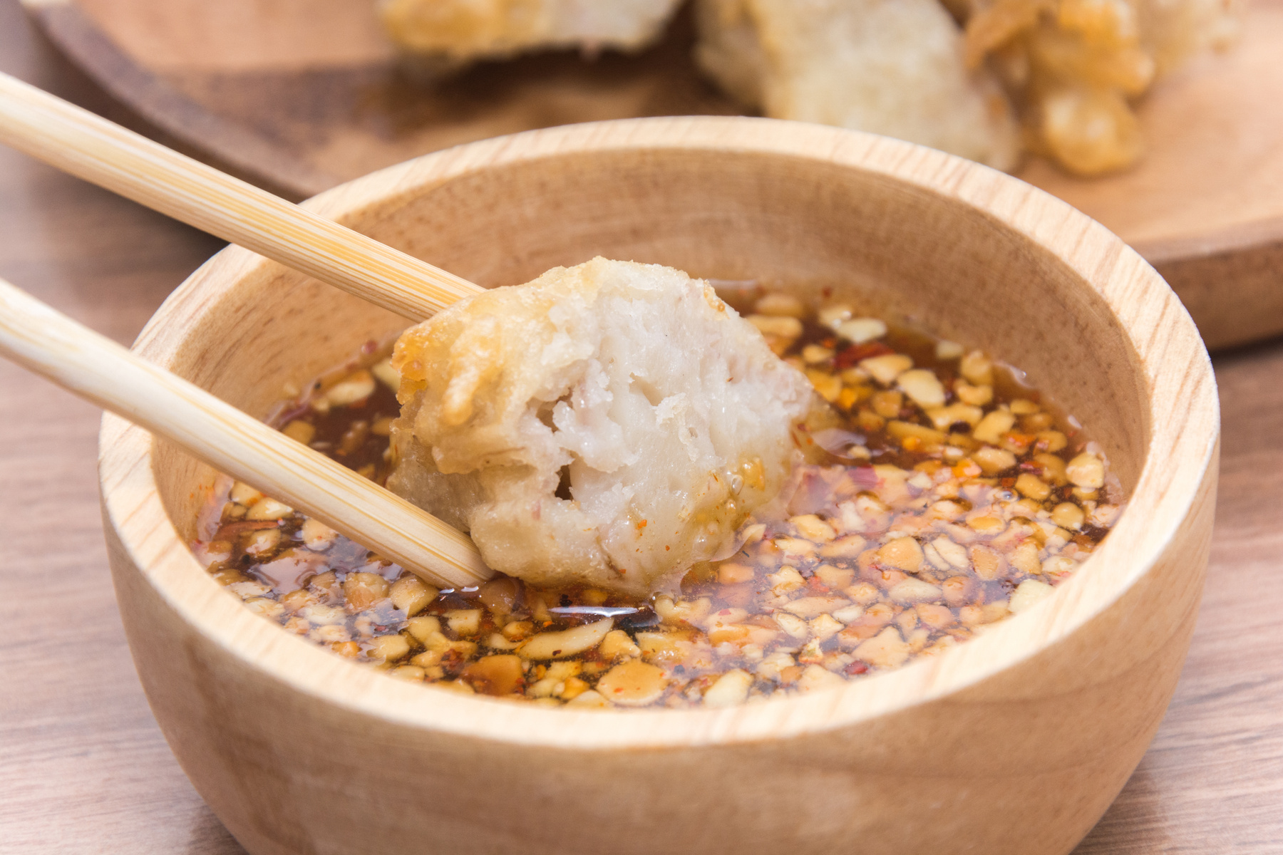 crispy fried taro and wooden stick